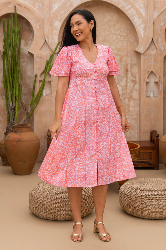 Primrose Dress with sleeves in Peach.
